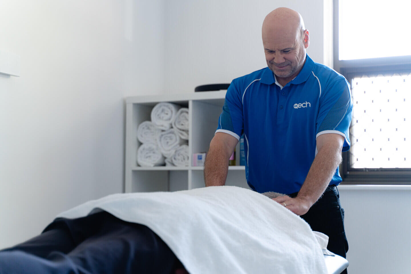 ECH resident receiving a Remedial Massage from ECH staff