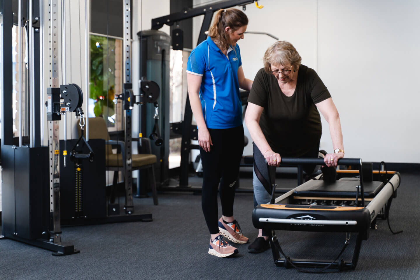 ECH resident receiving Occupational Therapy treatment in ECH gym.