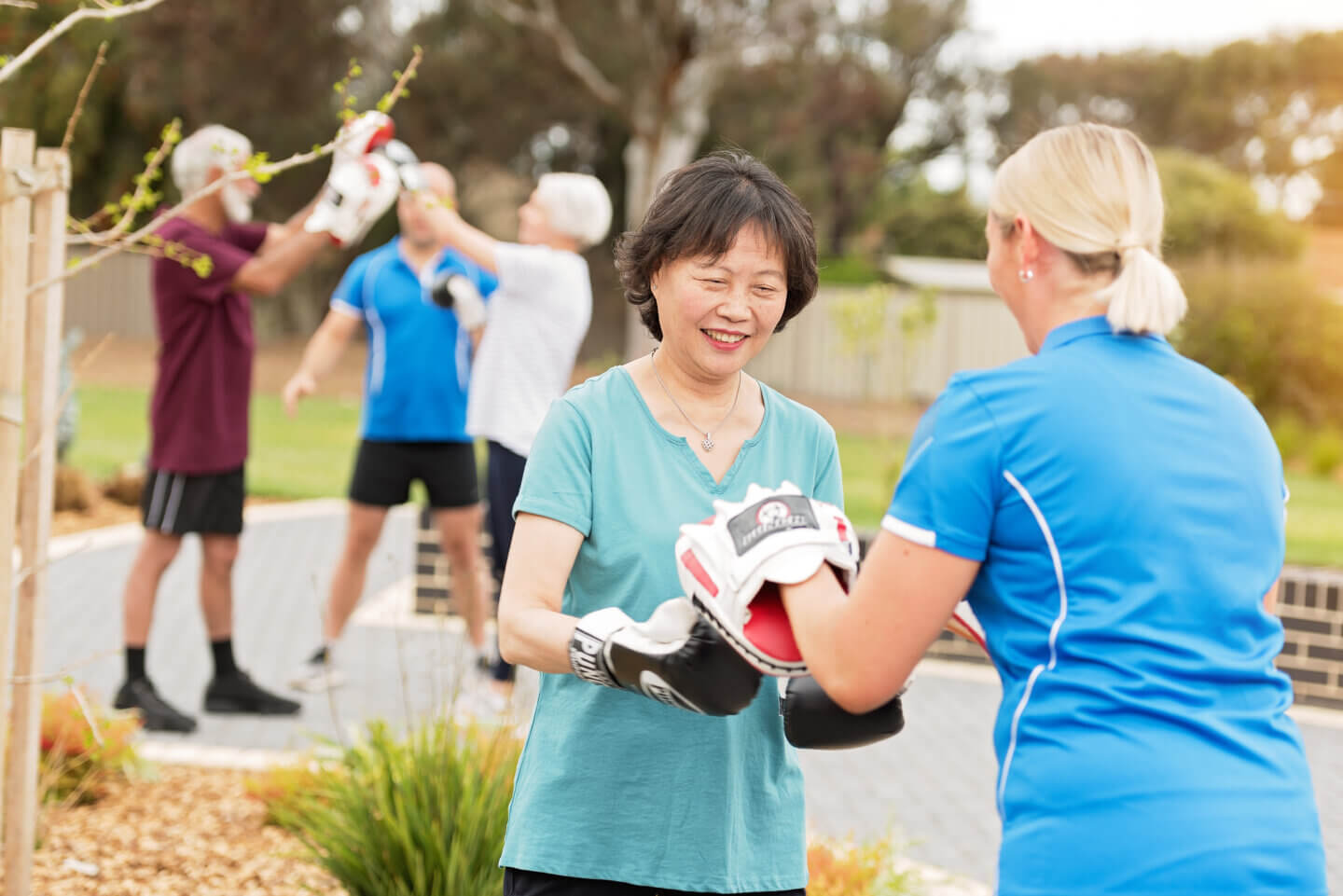 ECH residents enjoying boxing class in ECH Fitness Classes